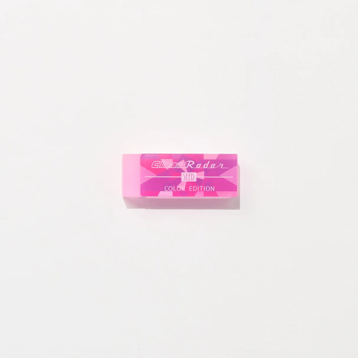 Seed Clear Radar Color Edition pembe silgi, fuşya desenli şeffaf ambalajıyla beyaz zeminde