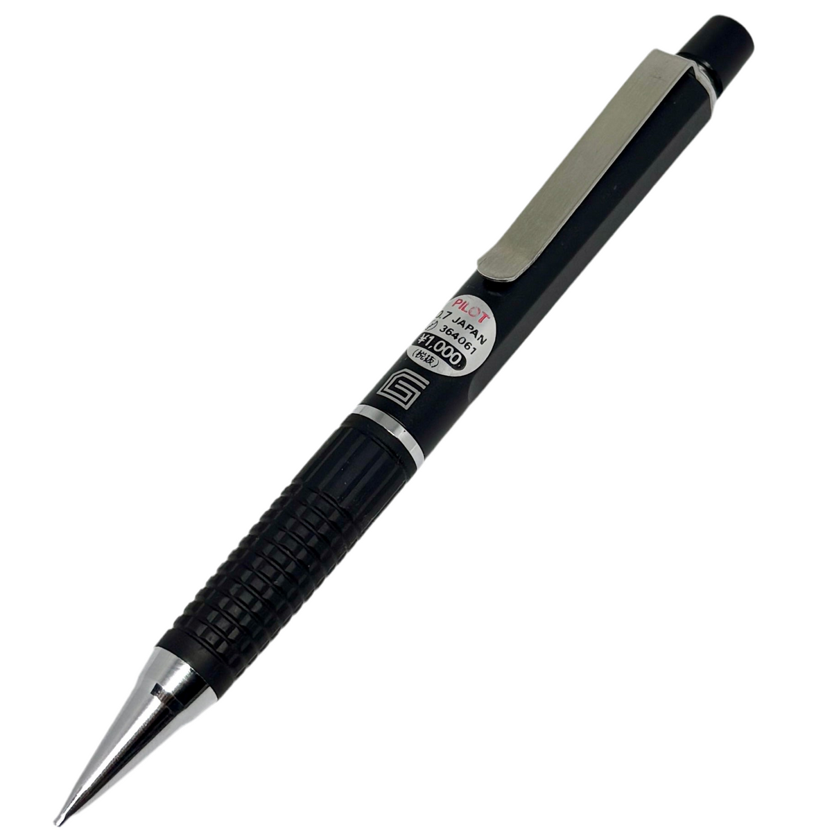 Pilot G vintage versatil kalem mat siyah gövde, geniş metal klips ve takılı Japonca fiyat etiketi, 0.7 mm