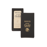 Seed Hyper Gold silgi krem beyaz gövdesi ve siyah altın varaklı kutusu yan yana
