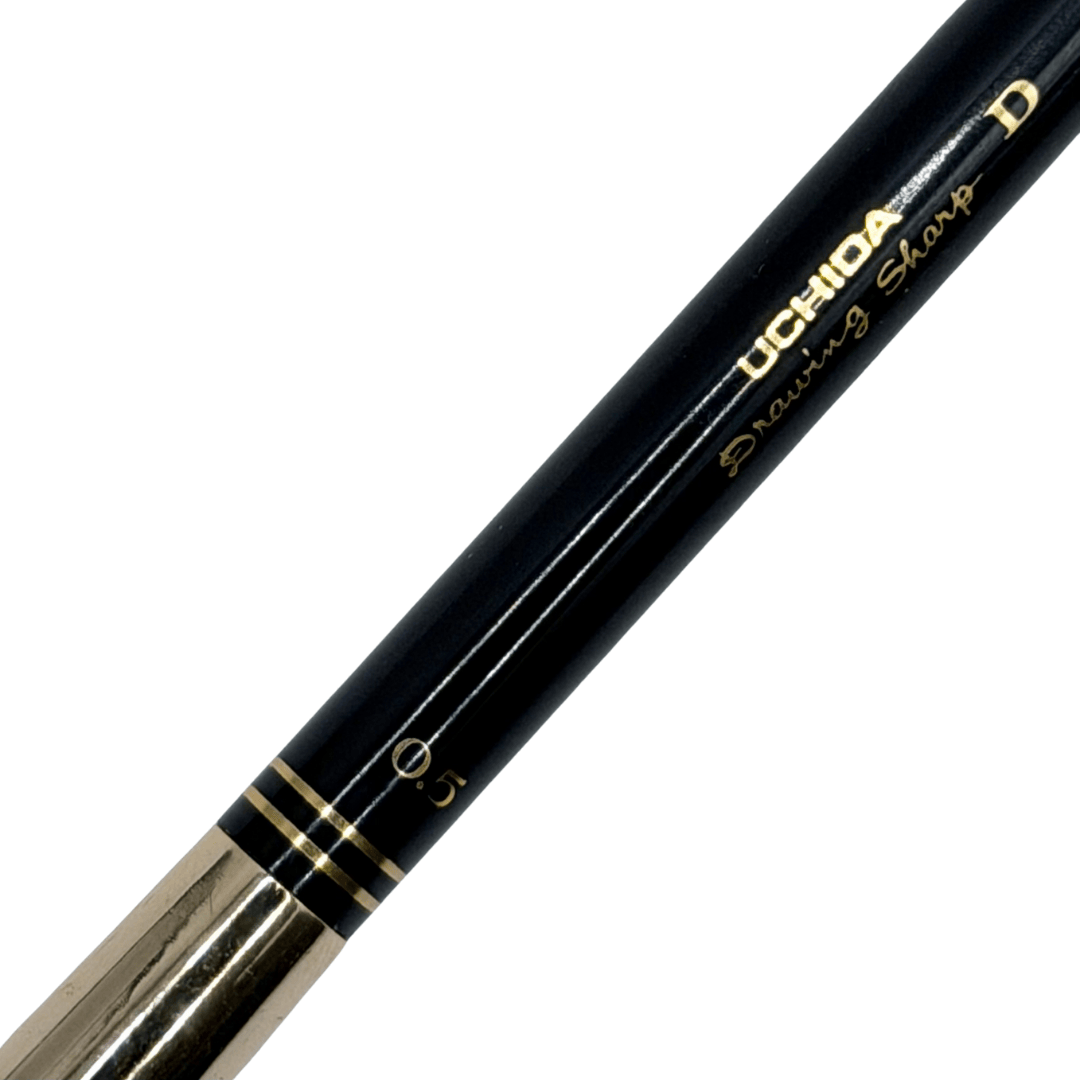 Uchida Drawing Sharp D gövde ile metal kavrama arasındaki altın halkalar ve 0.5 yazısı