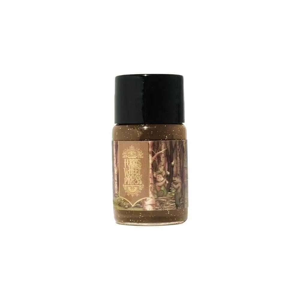 Ferris Wheel Press Curious Woods 10 ml mürekkep şişesi, altın simli kahve mürekkep ve orman illustrasyonlu etiket