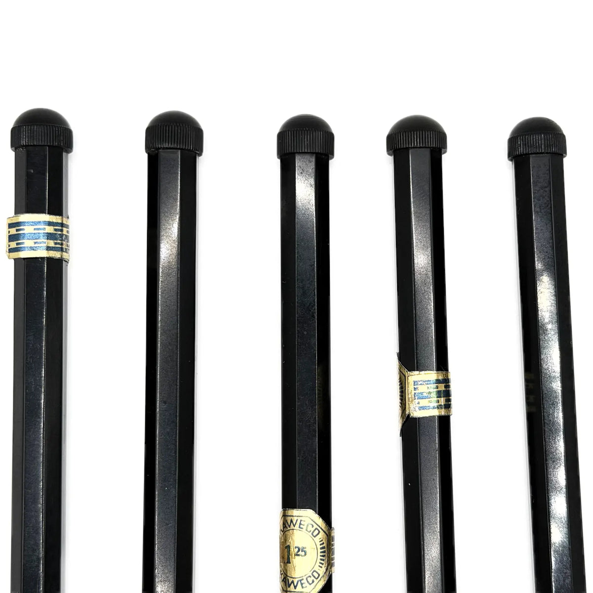 Kaweco vintage ince versatil kalemlerin tırtıllı çevirmeli başlıkları ve etiketleri