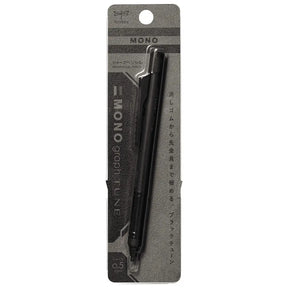 Tombow Mono Graph Tune siyah kalemin blister ambalajı, gri Mono desenli kart üzerinde 0.5 mm