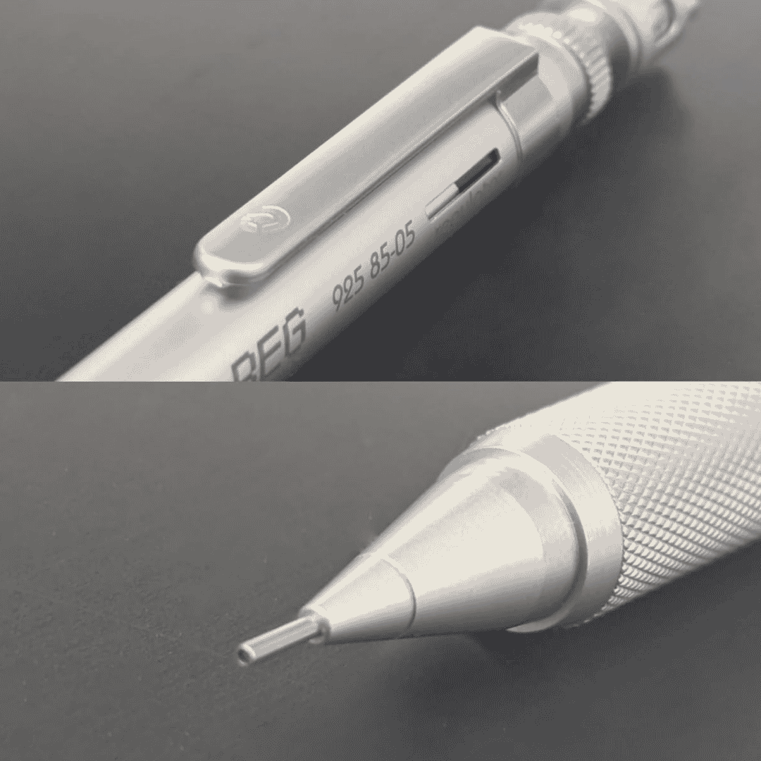 Staedtler REG kaleminin klips ve 925 85-05 baskısı üstte, altında tırtıklı kavrama ve uç yakın çekimi